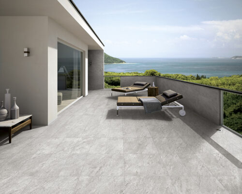 Modern design, gray tiles, seamless view, luxurious exterior bac